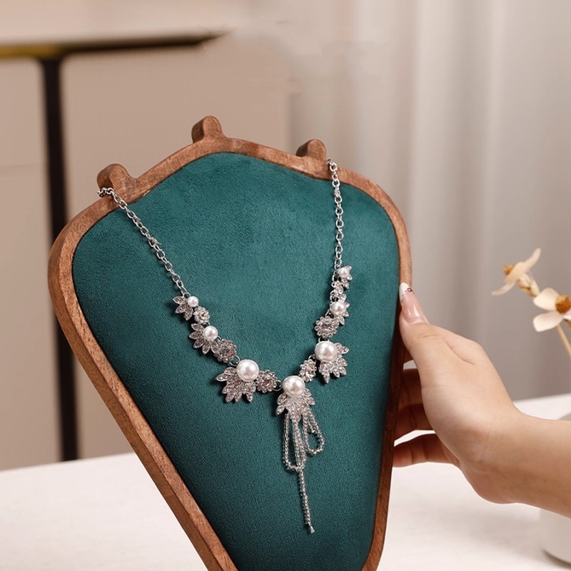 Houten kettingdisplaystandaard - Body Jewelry Stores recensie en prijs